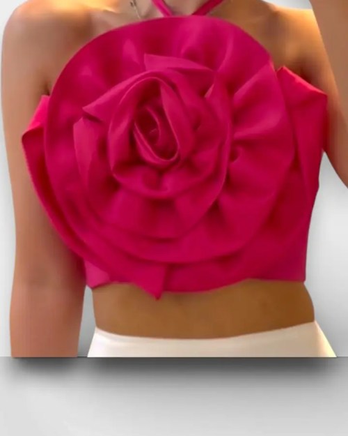 a girl wearing pink rose top